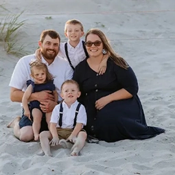 Image of family photo taken on the beach