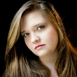 Image of woman posing with black background